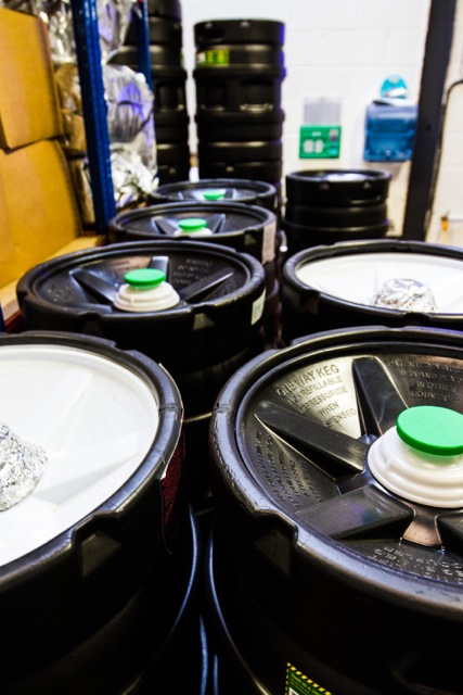 Cardiff, United Kingdom, November 26 2015. Stacked barrels of "Ryan Jones - Welsh Rugby Legends" beer at the Crafty Devil Brewery site, Canton, Cardiff, Wales.