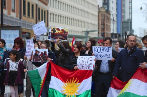 Kurdish families demonstrating in queen street seeking help from Uk government to prevent the genocide of their people fighting against ISIS