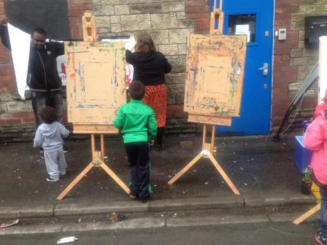 noticeboards for drawing on the side of a street
