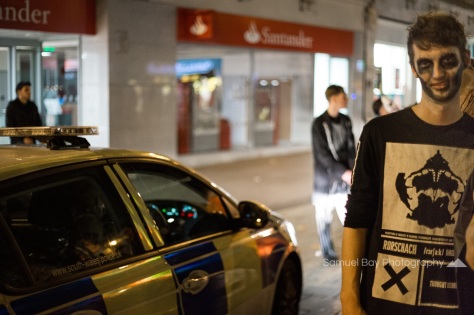 Revellers in fancy dress during Hallowe'en celebrations. The police arrived to make sure everyone was having enough fun- 1st November 2016 - Queen Street Cardiff, United Kingdom. ©Samuel Bay